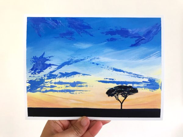 Lone Acacia tree at sunset