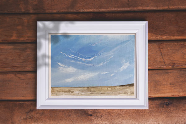 painting of beach and blue sky