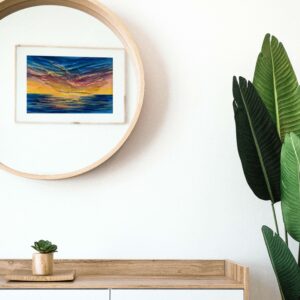 vibrant acrylic sunset painting in mirror reflection